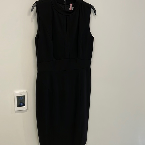 Black dress from Nordstrom size 6. MIDI with key hole at neck line. - Picture 1 of 3